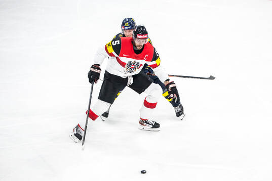 Thomas Raffl of Austria and Isac Lundeström of Sweden