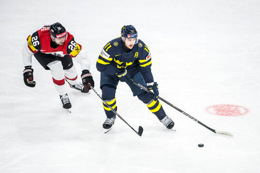 Oliver Achermann of Austria and Mikael Backlund of Sweden