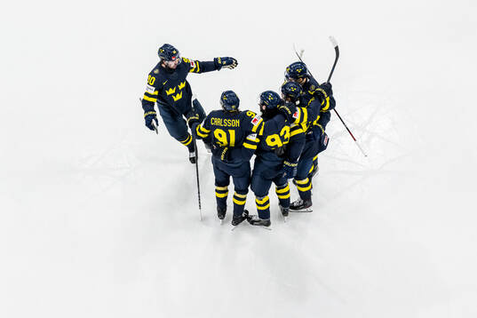 Mika Zibanejad and Marcus Johansson of Sweden celebrating