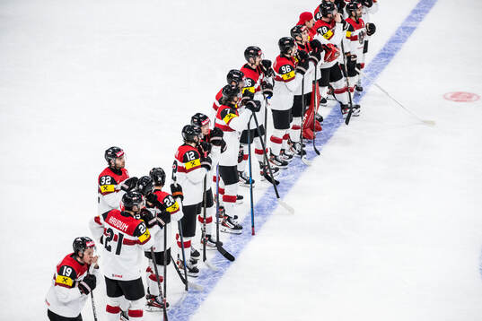 Players of Austria look dejected