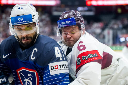 Pierre-Edouard Bellemare of France and Markuss Komuls of