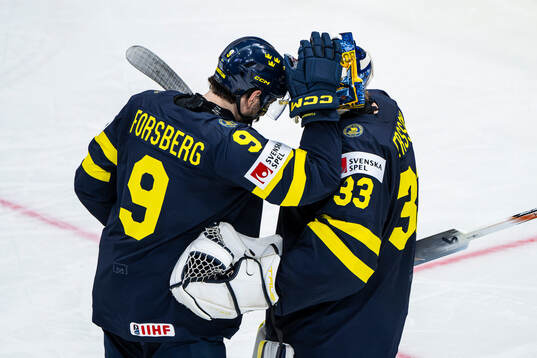 Filip Forsberg and goaltennder Samuel Ersson of Sweden