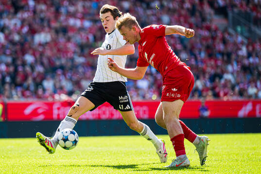 Sverre Halseth Nypan of Rosenborg and Aune Heggebø of Brann