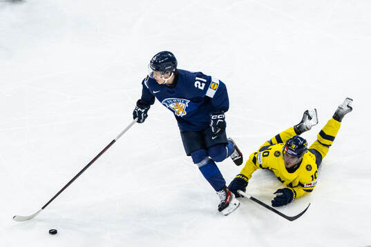 Patrik Puistola of Finland and Alexander Wennberg of Sweden