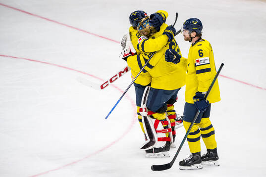 Lucas Raymond, goaltender Jacob Markström and Adam Larsson