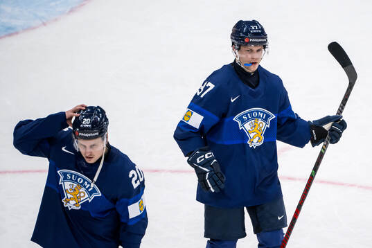 Eeli Tolvanen and Atro Leppänen of Finland look dejected