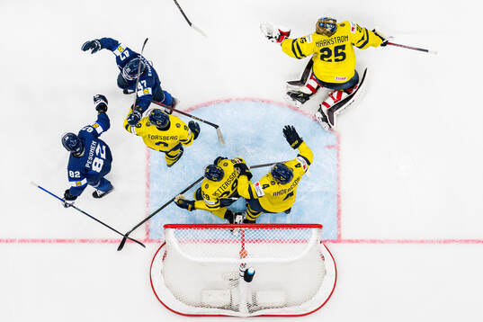 Eemil Erholtz and Harri Pesonen of Finland celebrate
