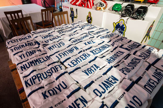 Jerseys of the gold-winning Finnish national ice hockey