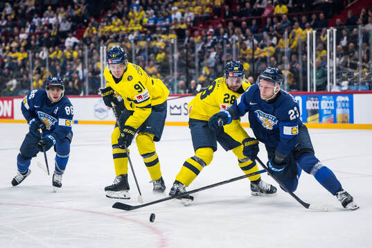 Leo Carlsson and Elias Lindholm of Sweden compete for the