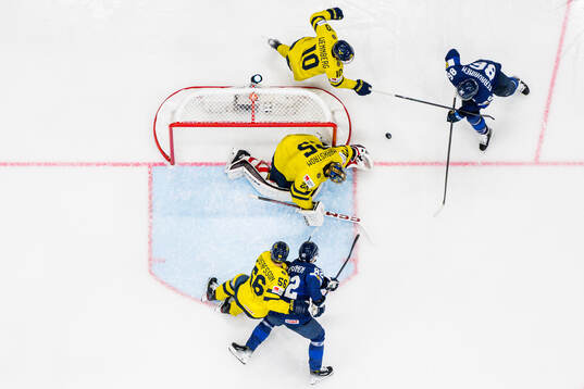 Erik Gustafsson, goaltender Jacob Markström and Alexander