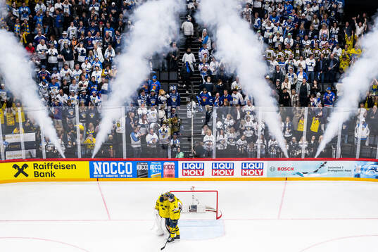 goaltender Jacob Markström and Adam Larsson of Sweden