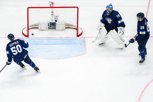 goalkeeper Juuse Saros of Finland looks dejected