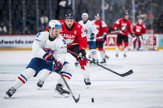 Alexandre Texier of France and Ryan O’Reilly of Canada