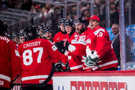 Sidney Crosby and goaltender Marc-André Fleury of Canada