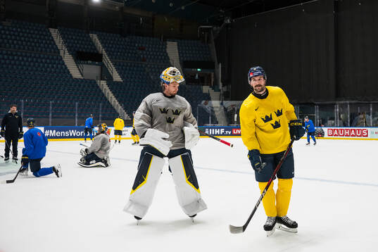Goaltender Samuel Ersson and Filip Forsberg at a practice