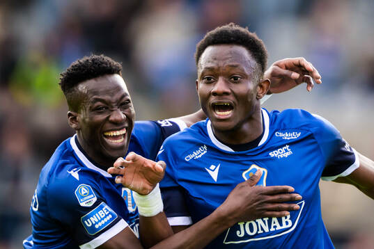 Halmstads Naeem Mohammed och Yannick Agnero jublar