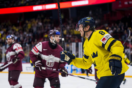 Jonas Brodin of Sweden celebrates