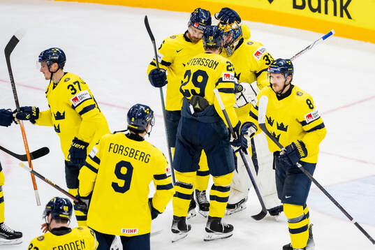 Adam Larsson, Marcus Pettersson and goaltender Samuel