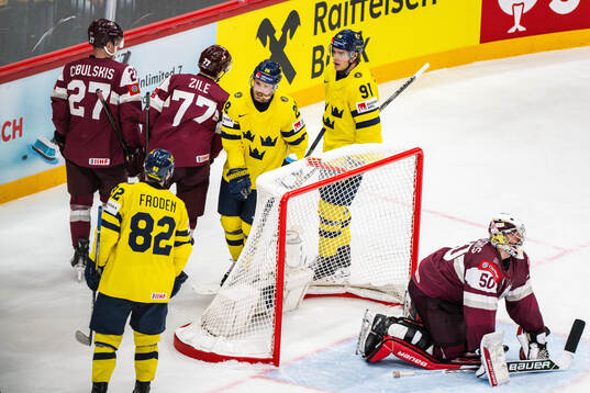 Elias Lindholm of Sweden celebrates the 0-6 goal behind