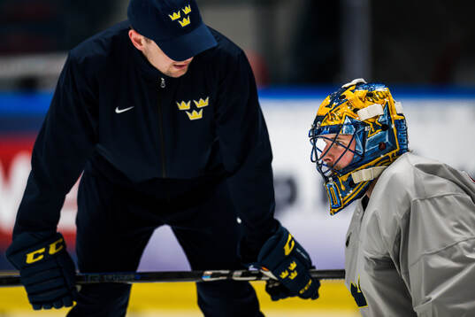 Goaltender coach Anthon Hansson and goaltender Samuel
