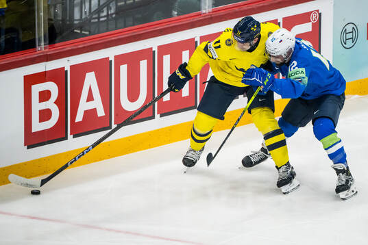 Mikael Backlund of Sweden and Nik Simsic of Slovenia