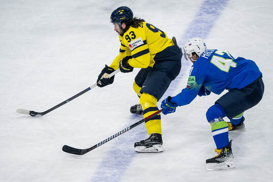 Mika Zibanejad of Sweden and Rok Macuh of Slovenia