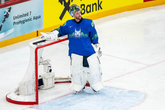 Goaltender Lukas Horak of Slovenia