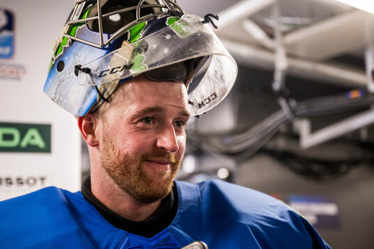 Goaltender Lukas Horak of Slovenia