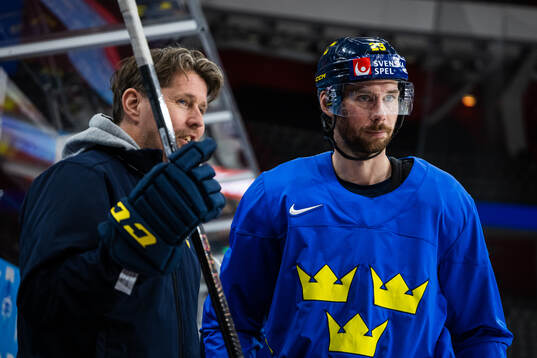 Assistant coach Stefan Klockare and Marcus Pettersson of