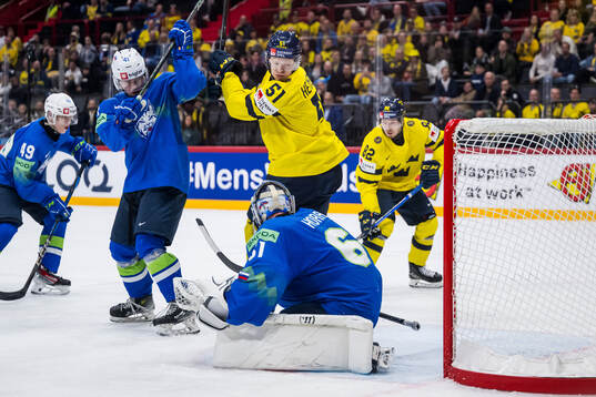 Emil Heineman of Sweden against Jan Cosic and goaltender