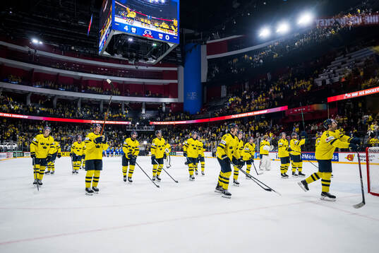 Players of Sweden celebrate