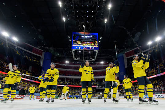 Players of Sweden celebrate