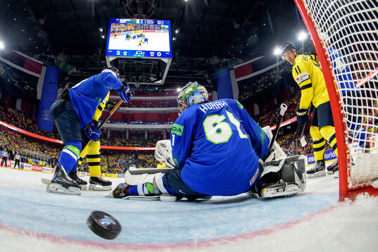 Elias Lindholm of Sweden,  not pictured, scores the 3-0
