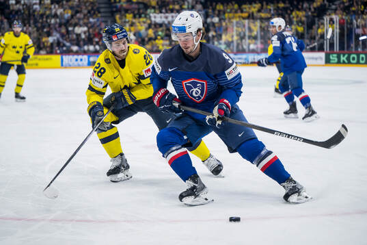 Elias Lindholm of Sweden and Alexandre Texier of France