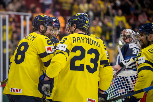 Elias Lindholm of Sweden celebrate with teammates