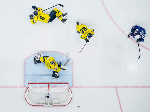 Nicolas Ritz of France against goaltender Samuel Ersson,