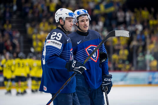 Louis Boudon and Enzo Guebey of France look dejected