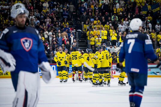 Players of Sweden celebrate