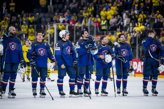Players of France look dejected