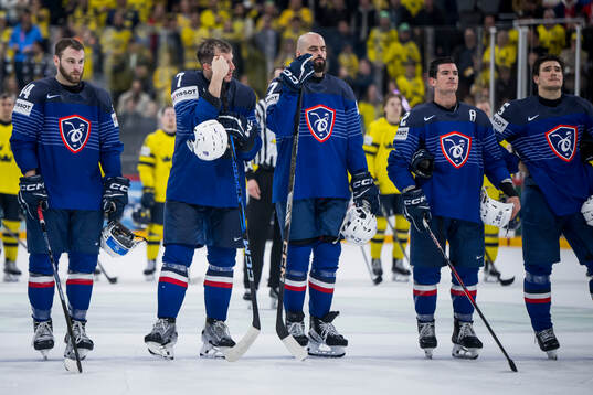 Pierre Crinon of France looks dejected