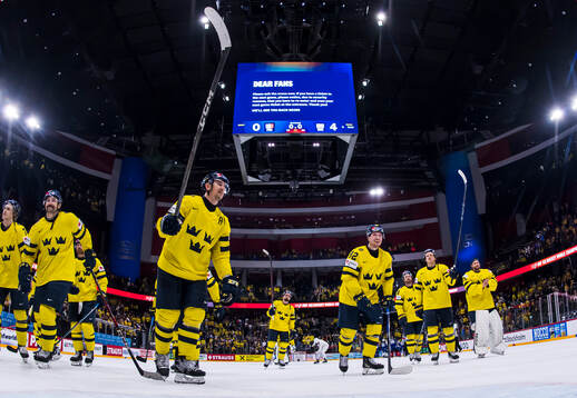 Mikael Backlund and Jesper Frödén of Sweden celebrate