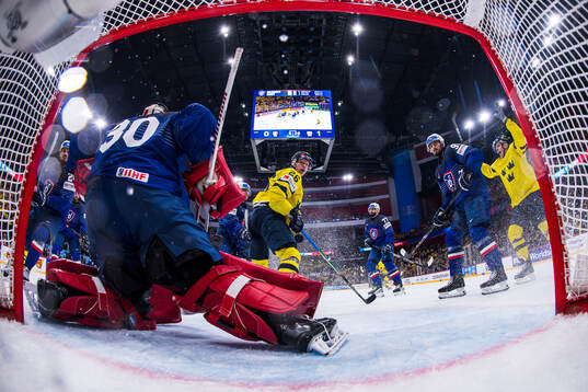 Anton Bengtsson and Max Friberg of Sweden celebrate the 0-2