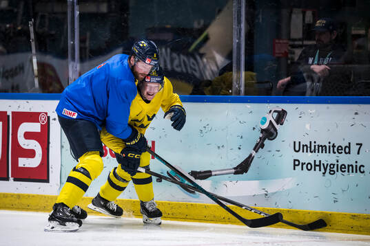 Adam Larsson and Emil Heineman of Sweden at a practice