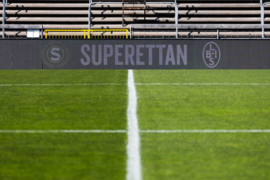 Ledreklam med texten Superettan