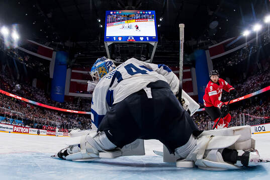 Goaltender Juuse Saros of Finland with a save against