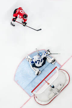 Ryan O'Reilly of Canada scores the 1-0 goal behind