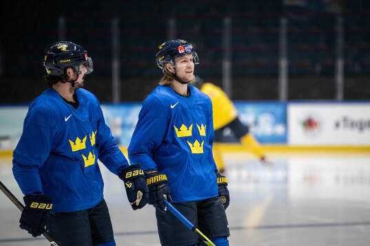 Marcus Johansson and William Karlsson of Sweden at a