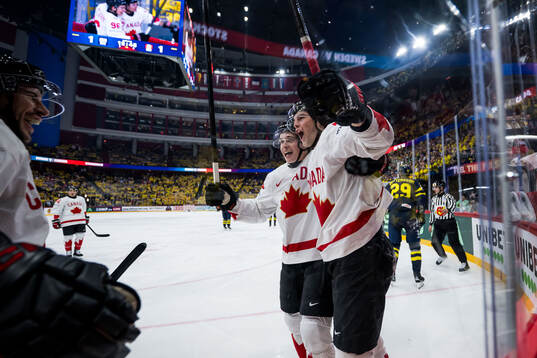 Noah Dobson, Macklin Celebrini and Tyson Foerster of Canada