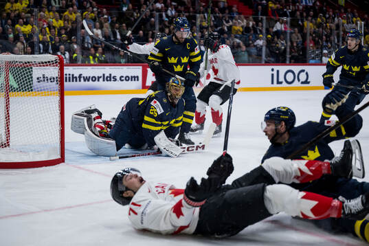 Goaltender Jacob Markström, Rasmus Andersson and Marcus