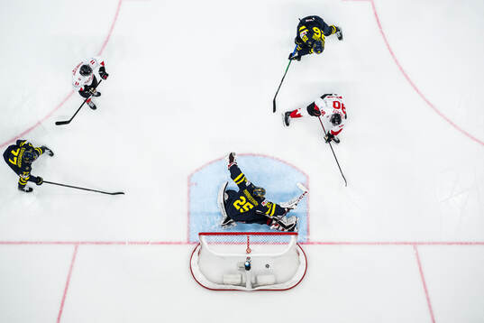 Ryan O'Reilly of Canada scores 1-3 behind goaltender Jacob